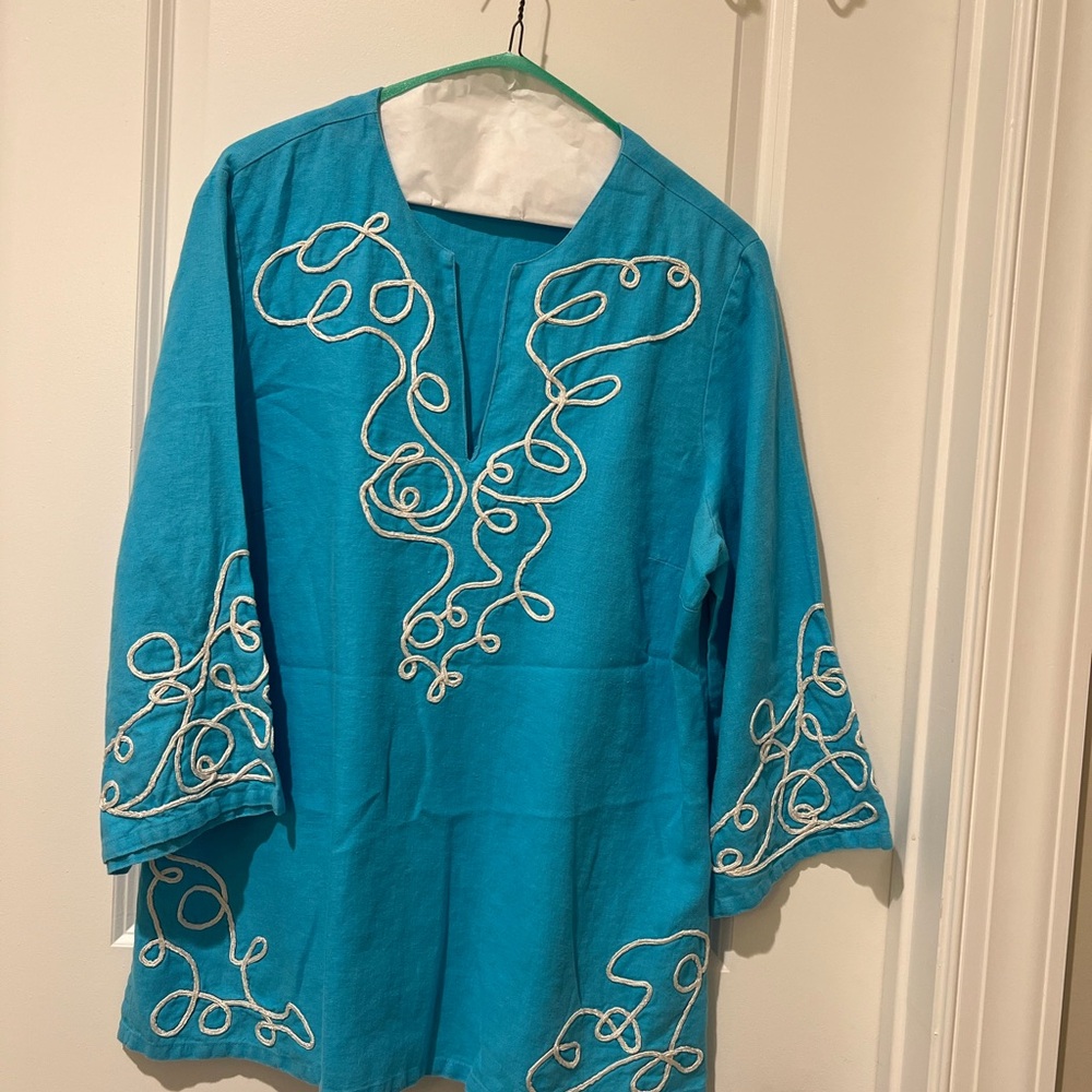 Beautiful blue linen tunic with white embroidery made by Lilly.